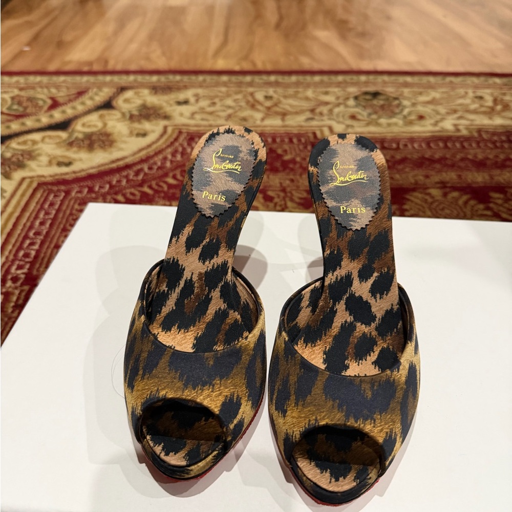 Christian Louboutin Leopard-Print Slide Mules in Brown and Black